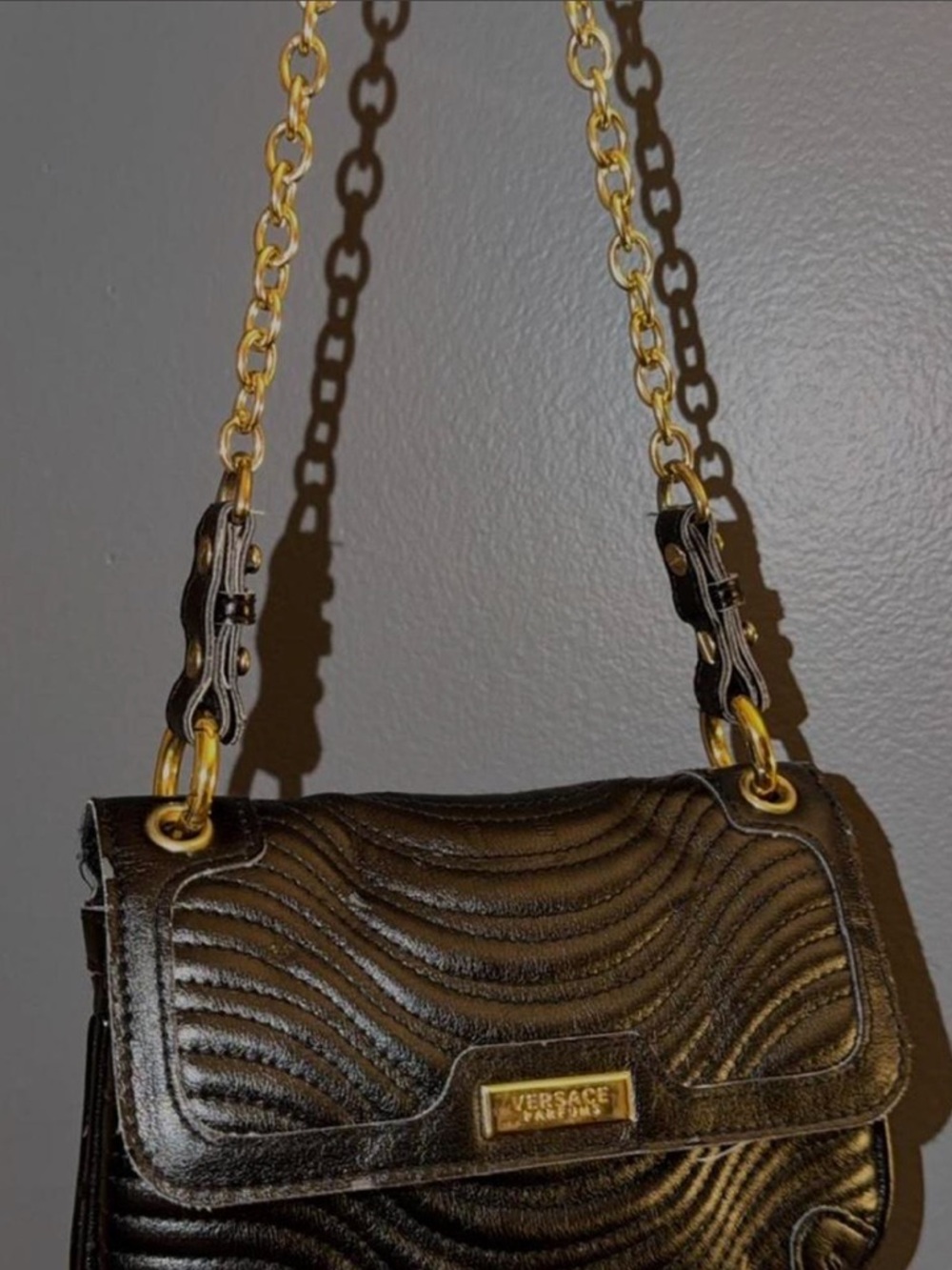 Black Quilted Leather Shoulder Bag with Gold Chain